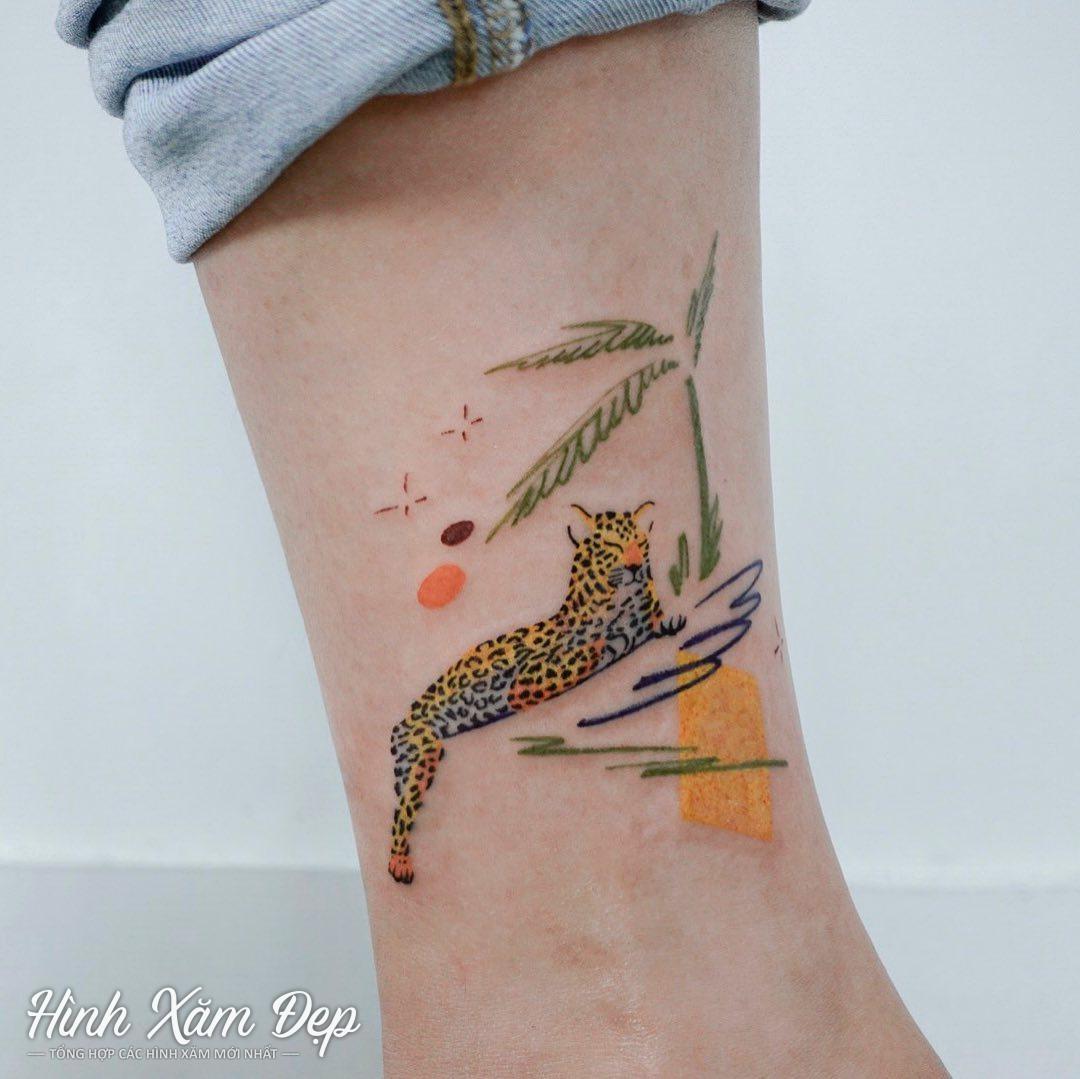 Hình xăm báo mini cổ chân