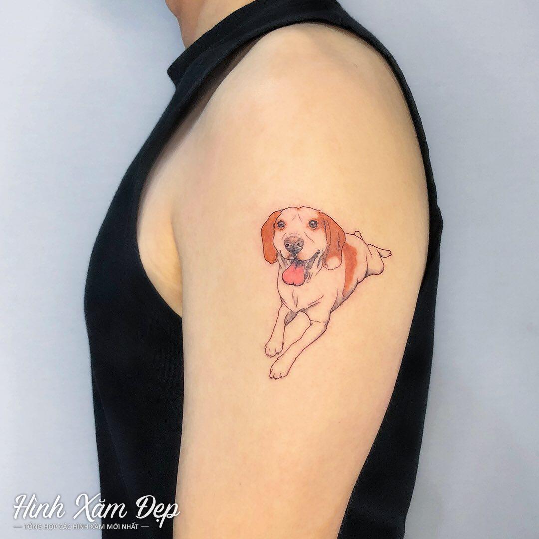 Hình xăm chú chó bắp tay (2)
