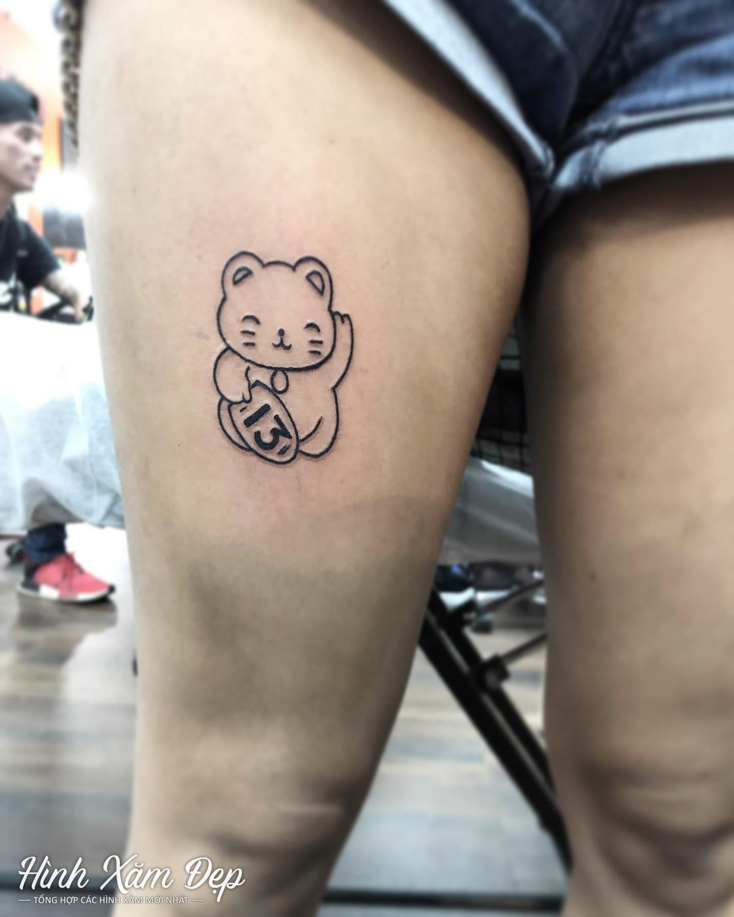 Hình xăm chú mèo mini bắp chân cho nữ