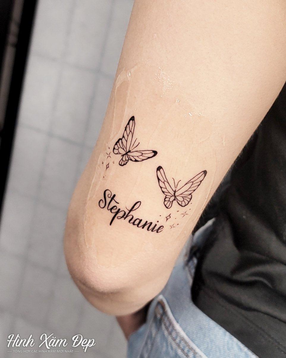 Hình xăm cướm mini và chữ sau bắp y