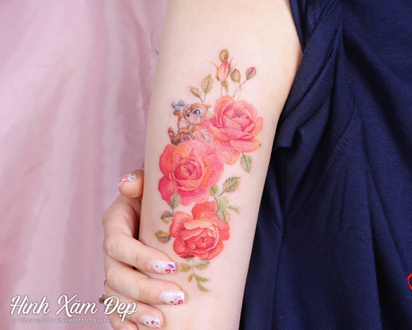 Hình xăm hoa hồng bắp tay