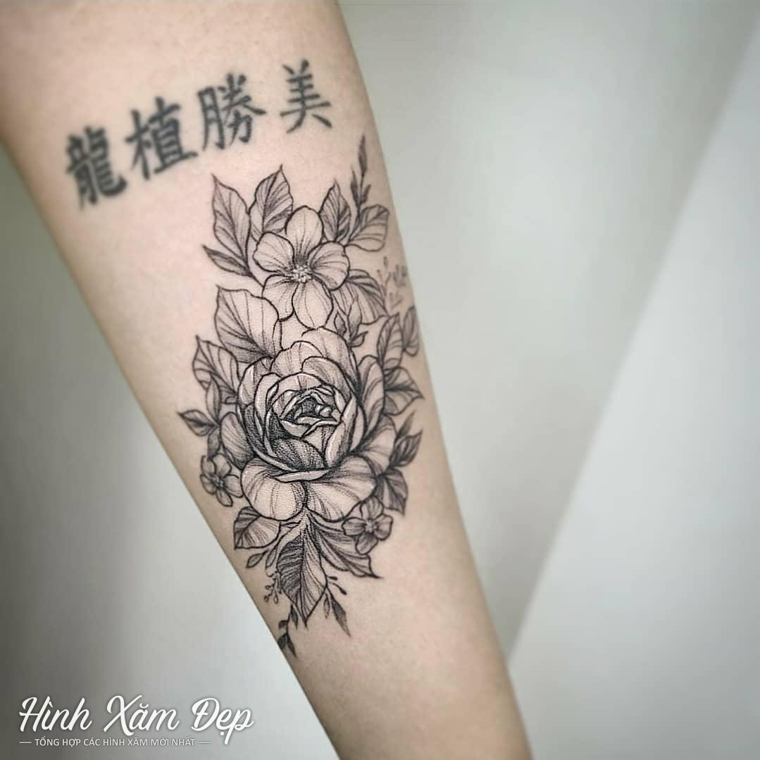 Hình xăm hoa mẫu đơn cánh tay