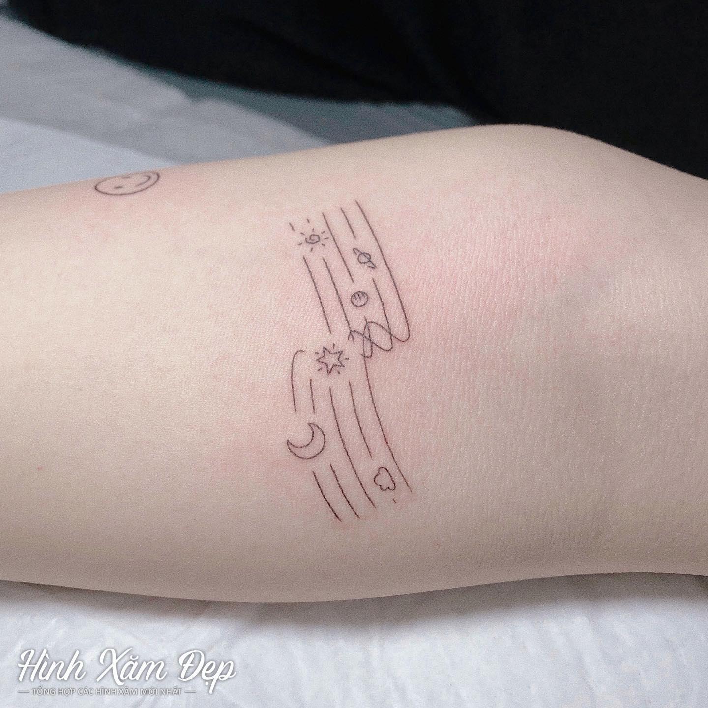 Hình xăm nốt nhạc cánh tay