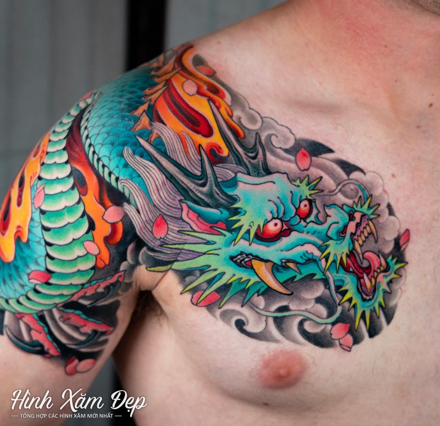Hình xăm rồng ngực sang bắp tay